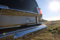 Web_65_Wagoneer_ICON_Tailgate_Detail_Into_Sun_thumb.jpg